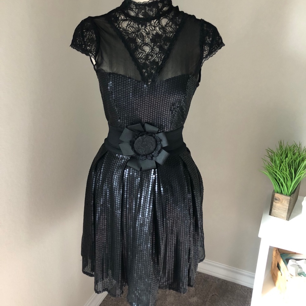 Bebe black sequin dress.